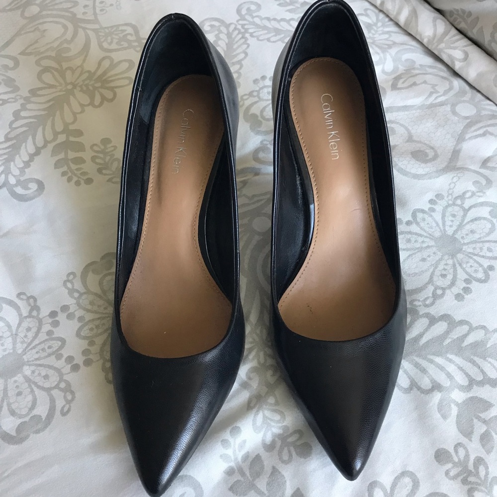Calvin Klein dark brown(coffee) shoes.